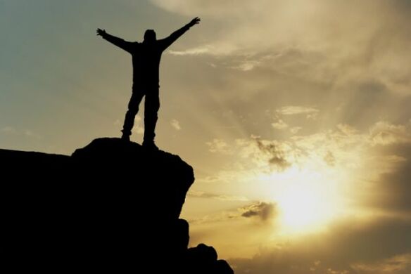 the man on the top of the mountain