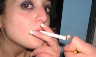 how to smoke a cigarette